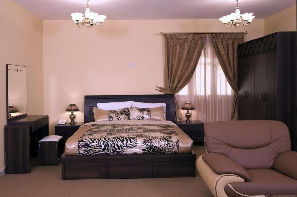 Tiger Home Hotel Apartments Маскат Экстерьер фото